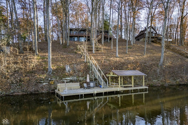 dock area with a water view