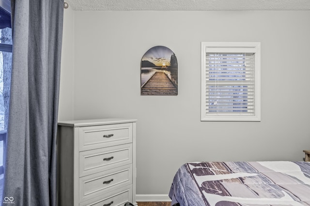 bedroom with a textured ceiling