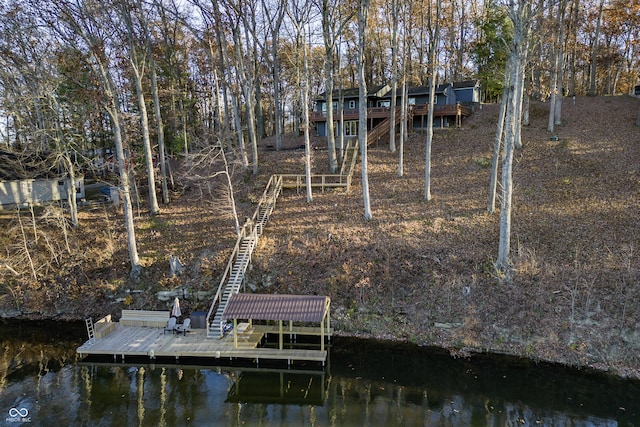 dock area with a water view