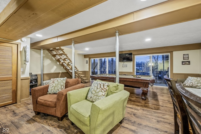 game room featuring wood walls, wood-type flooring, and billiards