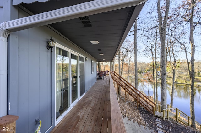 deck featuring a water view