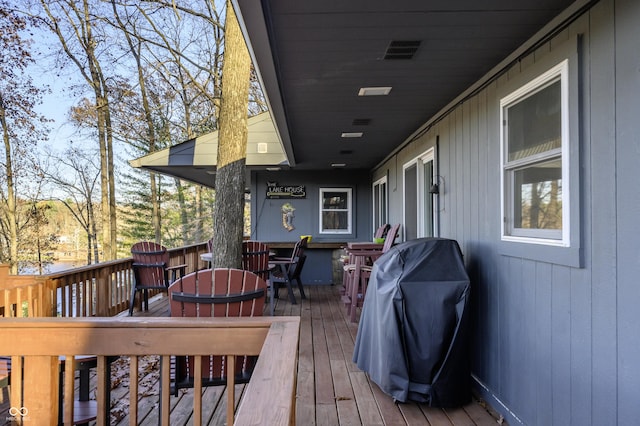 wooden deck featuring grilling area