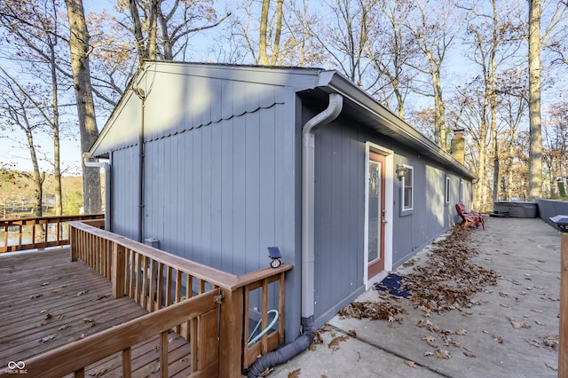 view of side of home featuring a deck