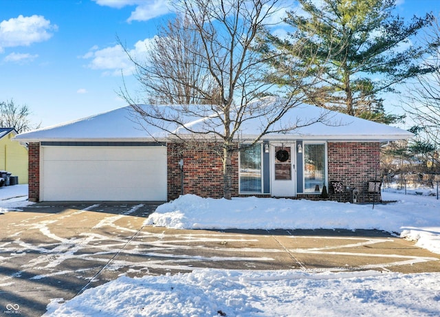 single story home featuring a garage