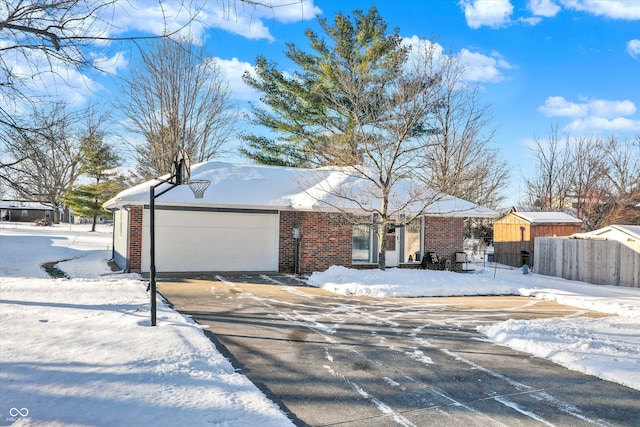 ranch-style home with a garage