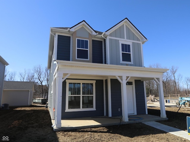 view of front of house featuring covered porch and board and batten siding