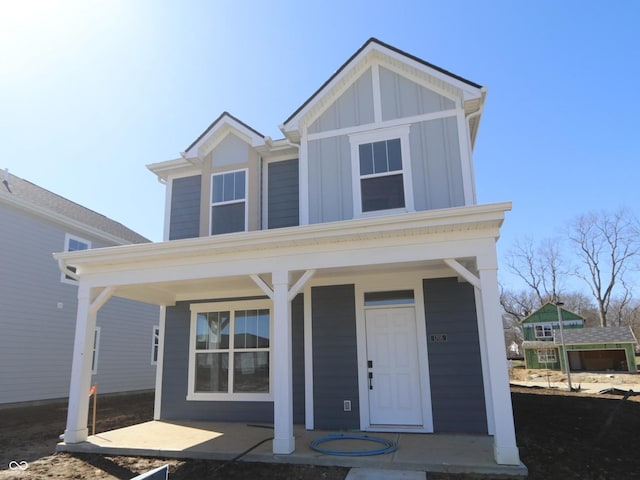 view of front of property featuring covered porch and board and batten siding