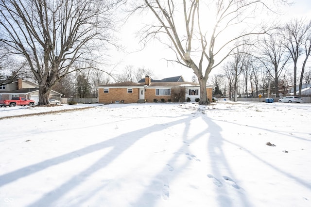 view of yard covered in snow