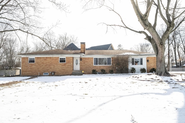 view of snow covered property