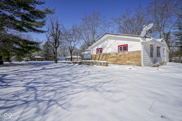 view of snow covered property