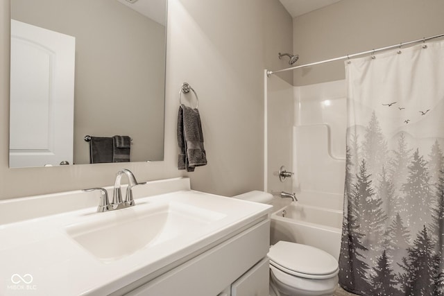 full bathroom with shower / tub combo, vanity, and toilet