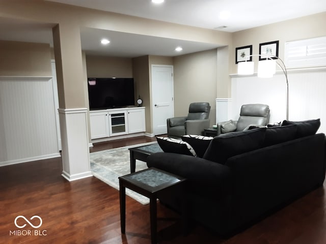 living room featuring dark hardwood / wood-style flooring