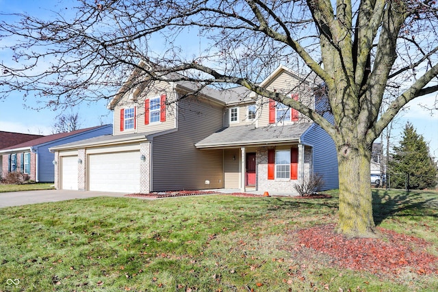 view of property with a garage and a front lawn