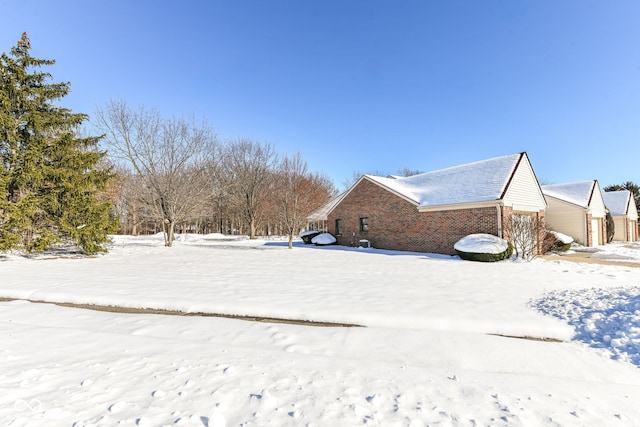 view of yard covered in snow