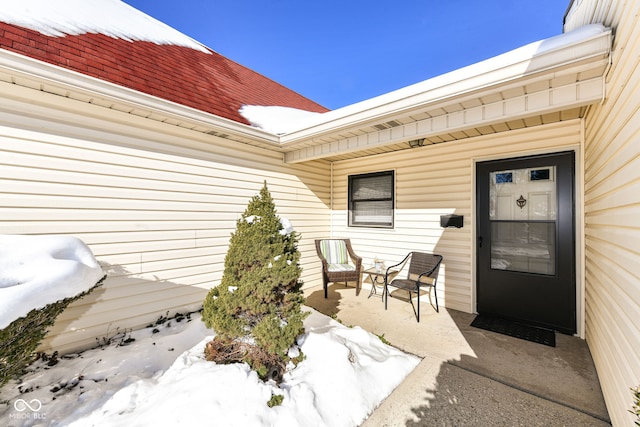 view of snow covered patio