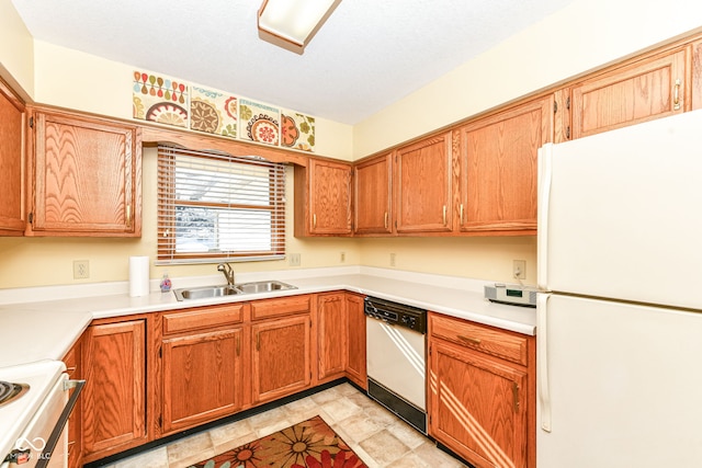 kitchen with sink and white appliances