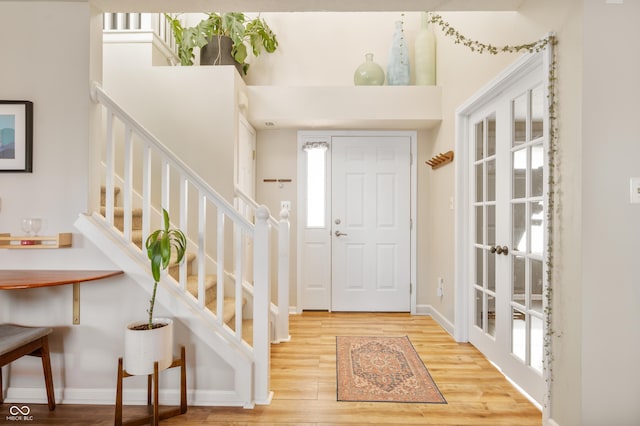 entryway featuring hardwood / wood-style flooring