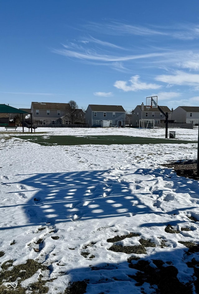 view of yard covered in snow