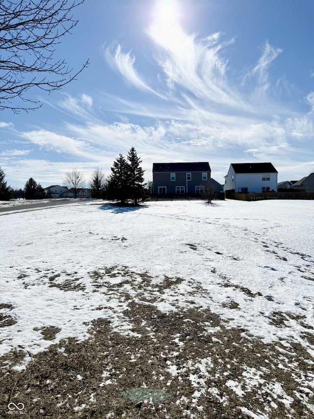 view of yard covered in snow