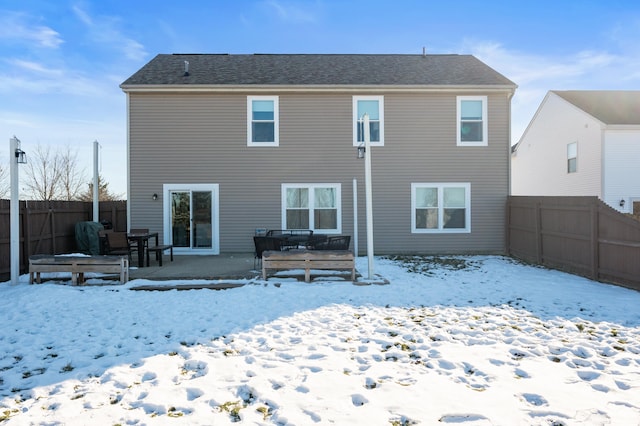 view of snow covered property