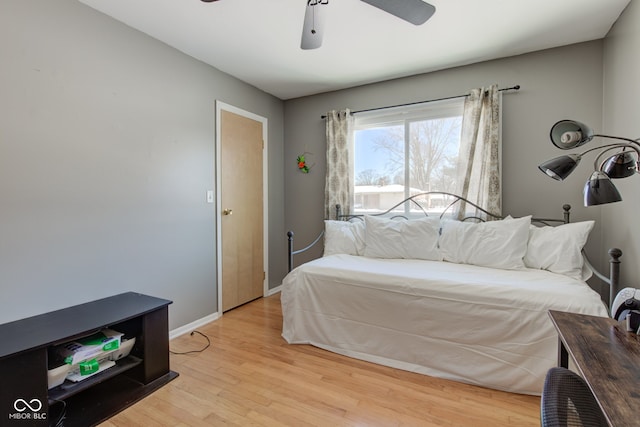 bedroom featuring ceiling fan and light wood-type flooring