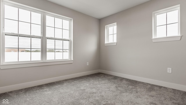 view of carpeted spare room