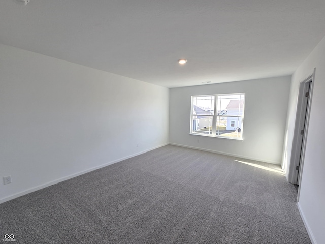 view of carpeted spare room