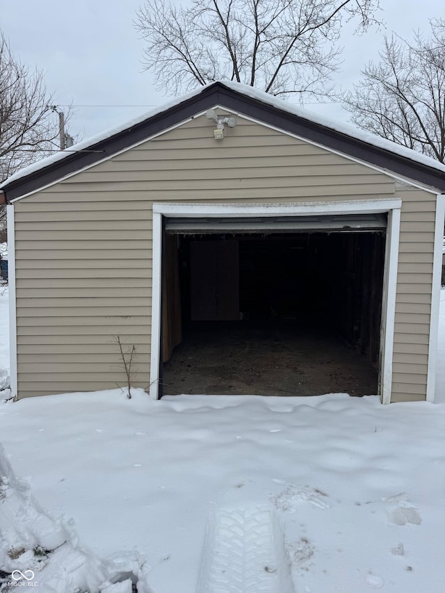 view of snow covered garage