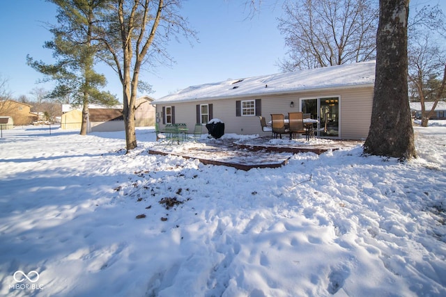 view of snow covered property