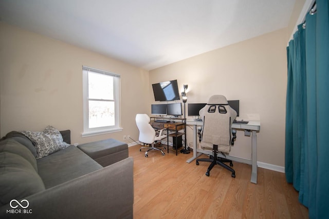 home office featuring light hardwood / wood-style flooring