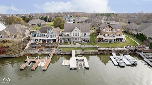 drone / aerial view with a water view