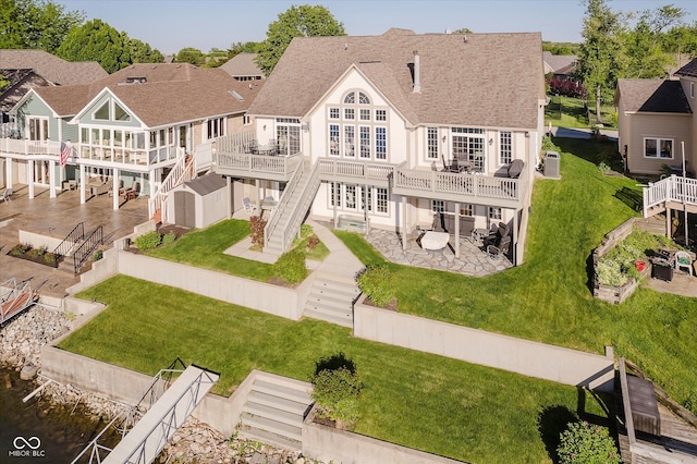 3150 Beach Blvd, Cicero, IN 46034 - rear view of house with a patio area, stairway, a deck, roof with shingles, and a yard