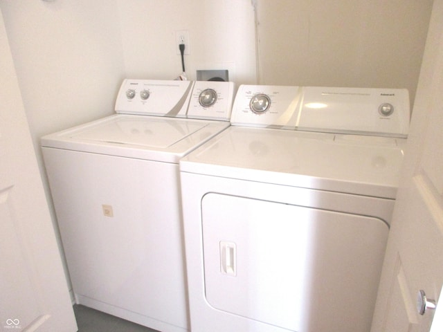 washroom featuring separate washer and dryer