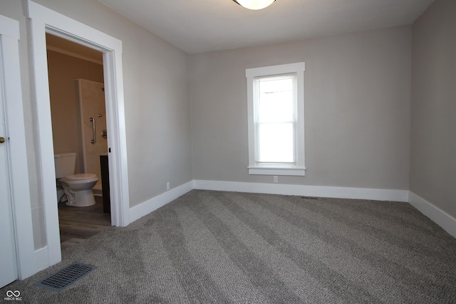 unfurnished room with carpet