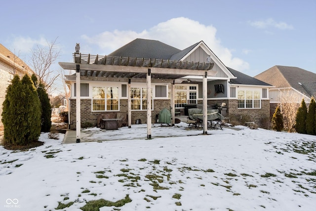 view of snow covered house