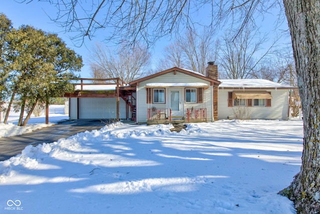 ranch-style house featuring a garage