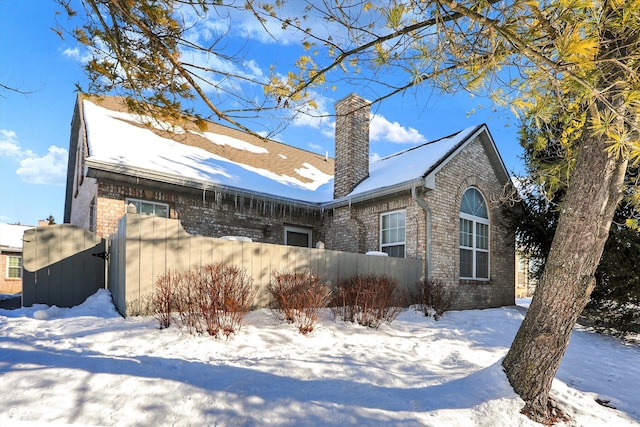 view of snow covered property