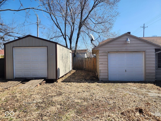 garage featuring fence