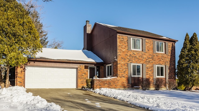 colonial home featuring a garage