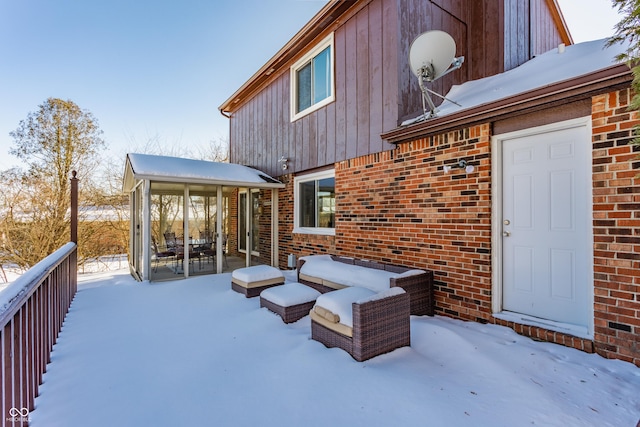 view of snow covered house