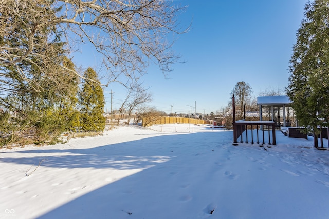 view of yard covered in snow