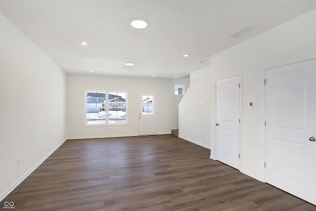 entrance foyer with dark hardwood / wood-style floors