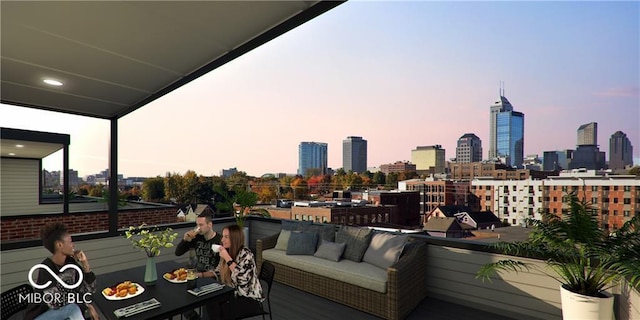 balcony at dusk with an outdoor living space