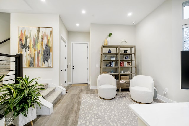 sitting room featuring light hardwood / wood-style floors