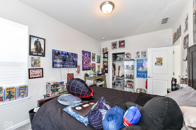 bedroom featuring carpet