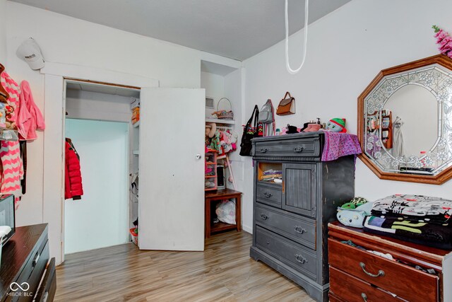 bedroom featuring light wood-type flooring