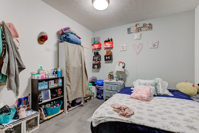 bedroom with a textured ceiling