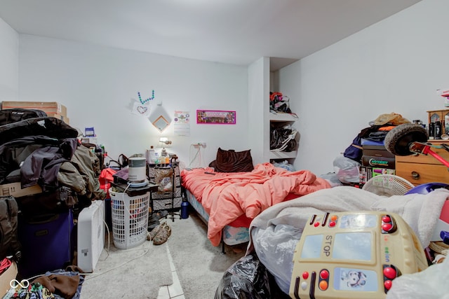 bedroom with light carpet