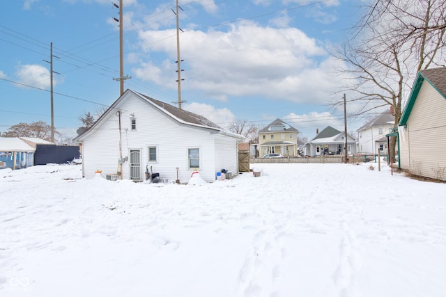 view of snow covered house