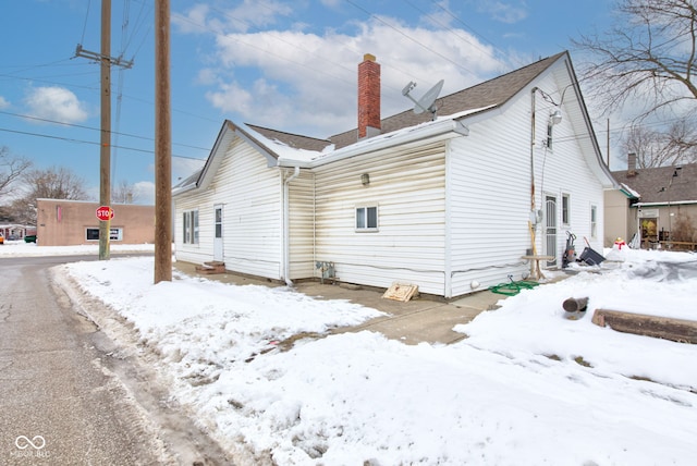 view of snow covered property